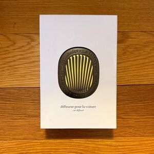 Diptyque Car Diffuser with Black and Gold Design